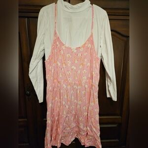 Cute pink strap dress with attached shirt.